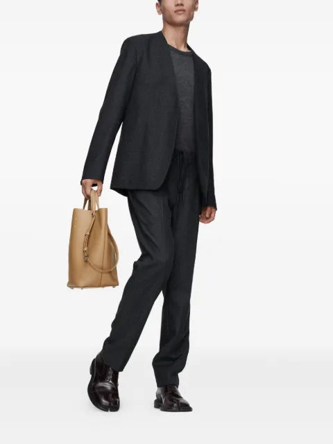 Maison Margiela four-stitch collarless blazer