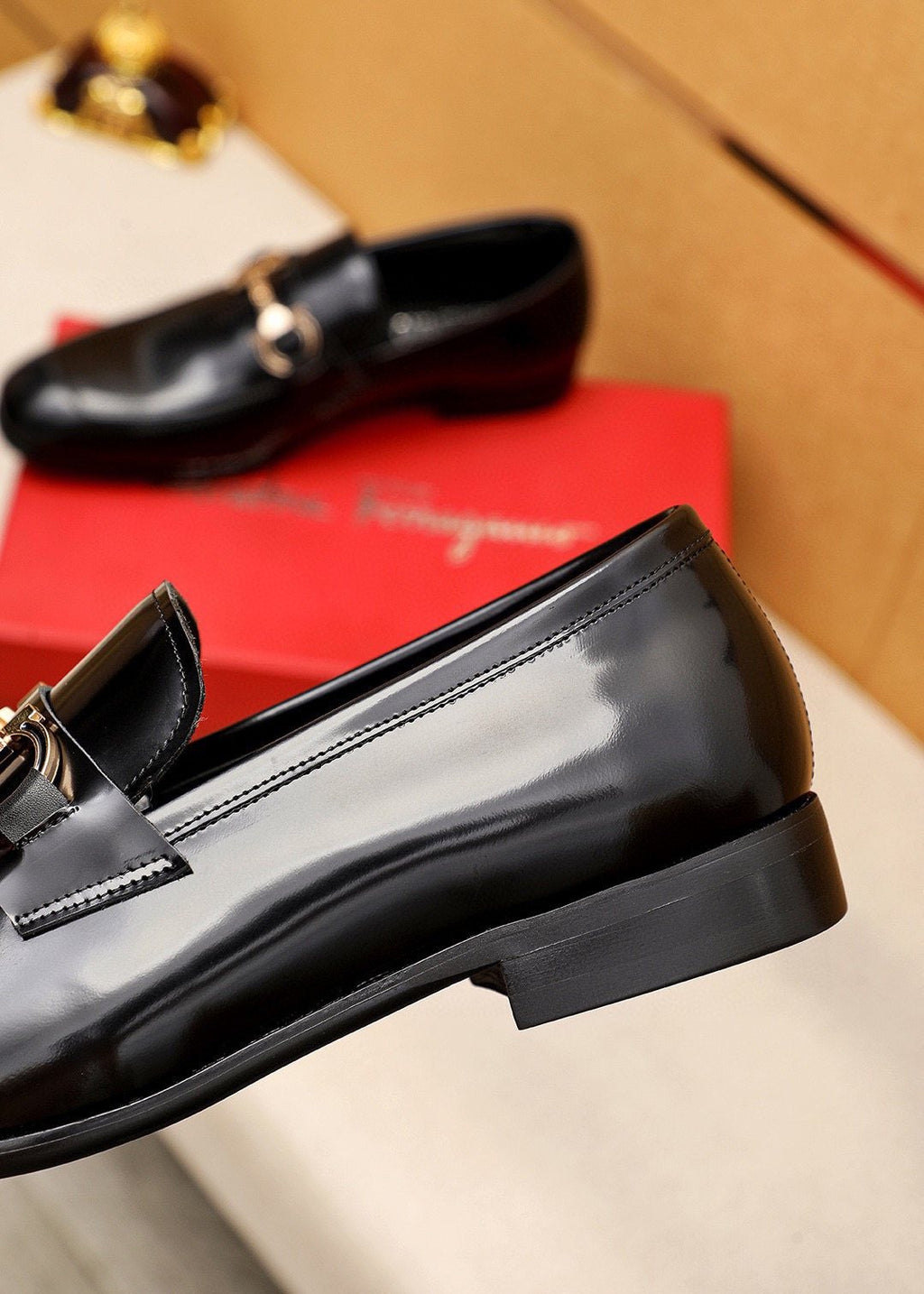 Ferragamo Black Buckle Loafers - Metallic Vamp Buckle