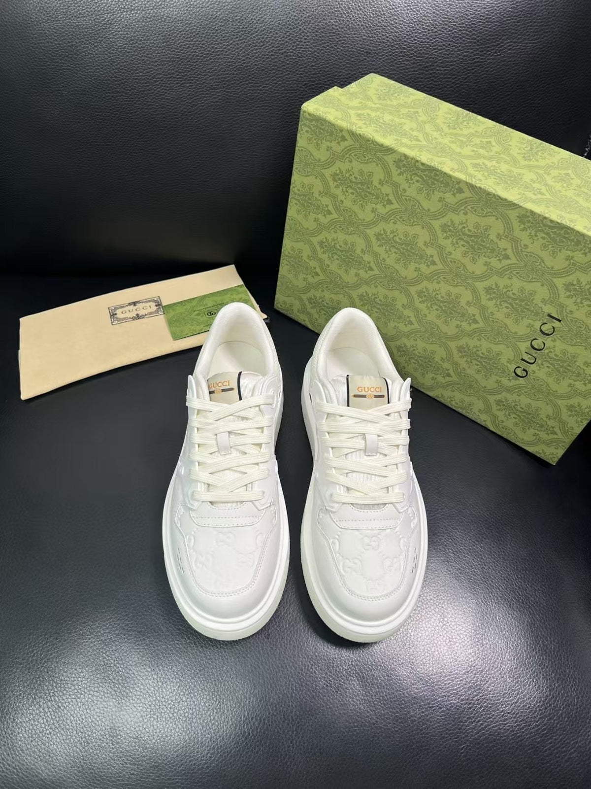 Gucci Embossed Low-Top Sneakers