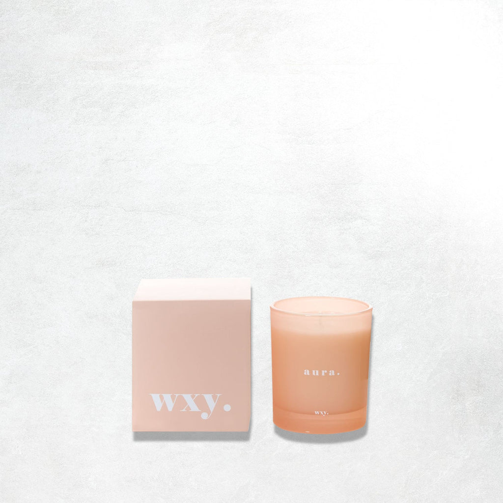 wxy. 7oz candle - aura: white woods & amber down
